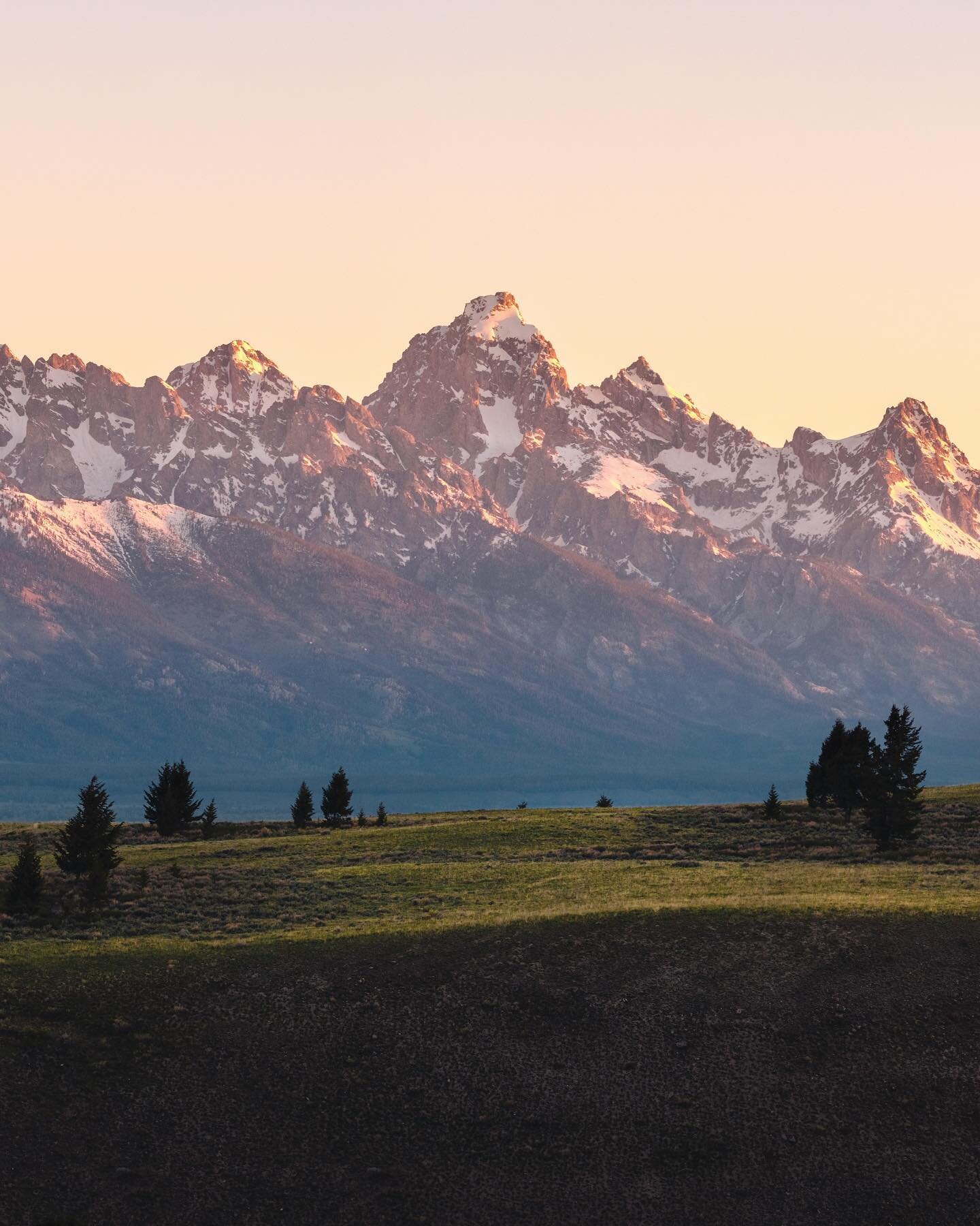 Tetons at sunrise. I&rsquo;ve been missing this place a little, and the time spent with friends among the wildflowers. It&rsquo;s a beautiful and special place. Swipe for a pano