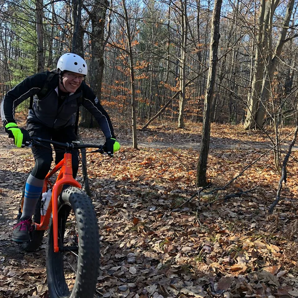 Chris Remy getting ready for fat bike season at Global Fat Bike Day at Cadillac Pathways. 