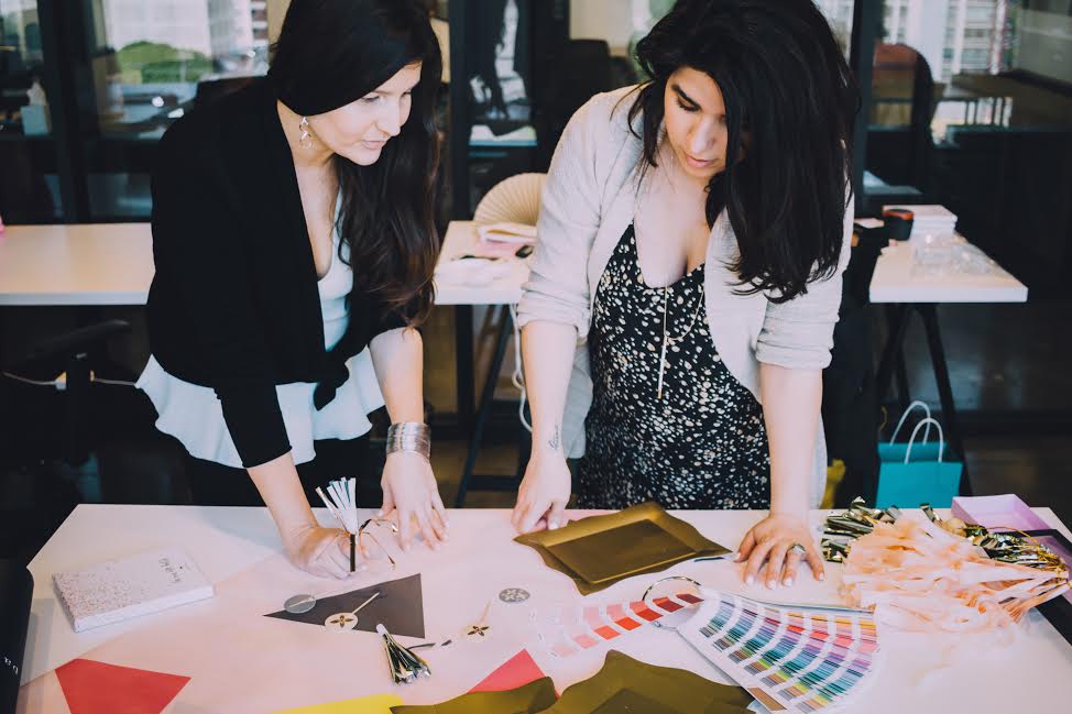Niku and Susy reviewing some of Paris312's latest designs