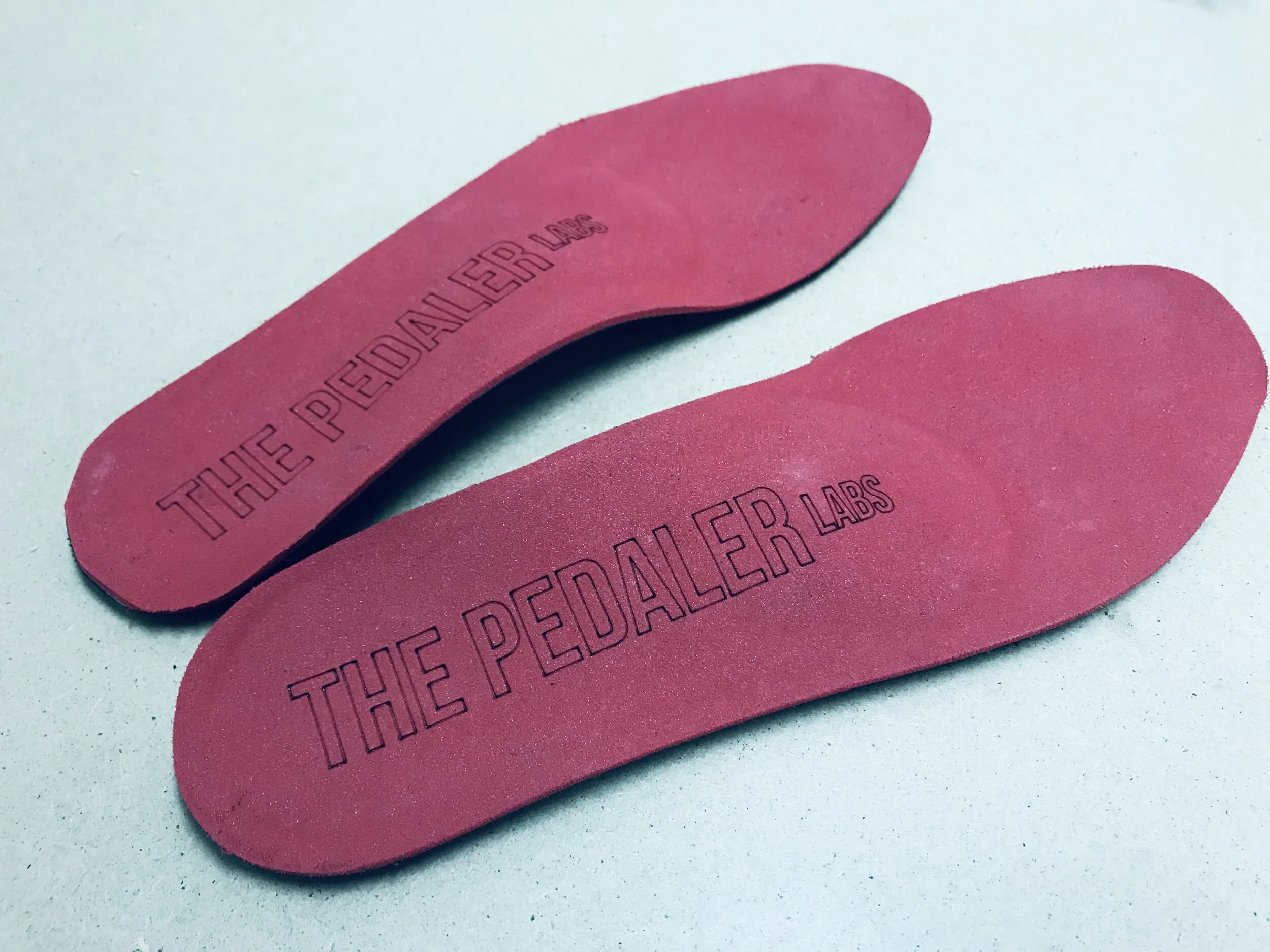 A pair of orthotic shoe inserts | The Pedaler