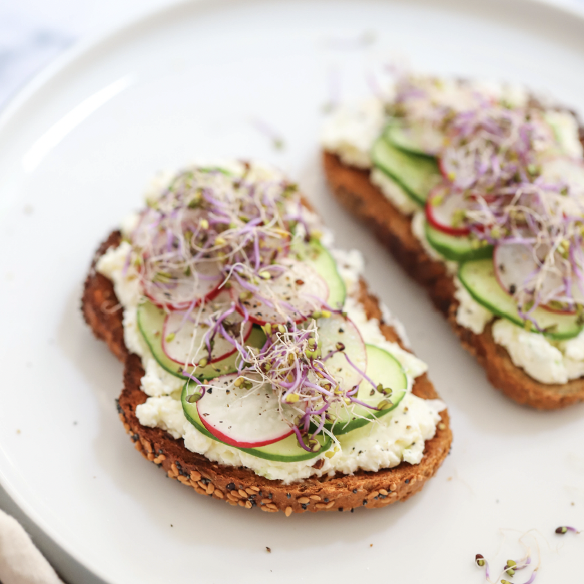 CUCUMBER TOAST WITH RADISHES AND SPROUTS