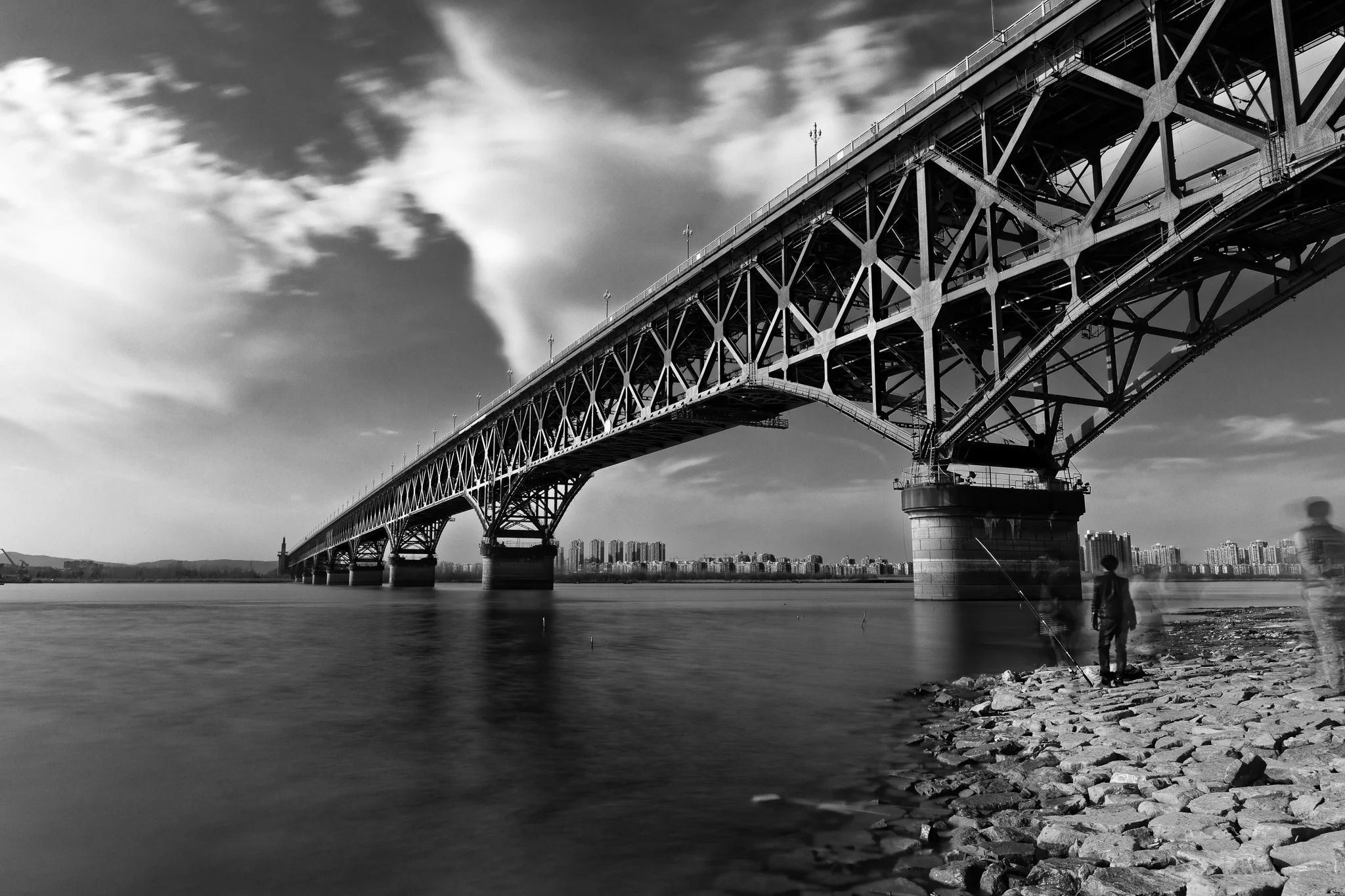 Fishing_beneath_the_bridge.jpg
