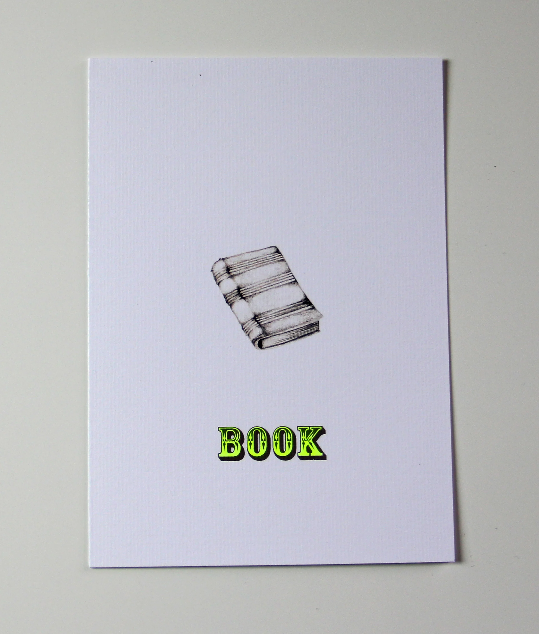 BOOK GLOW-IN-THE-DARK NEON CARD