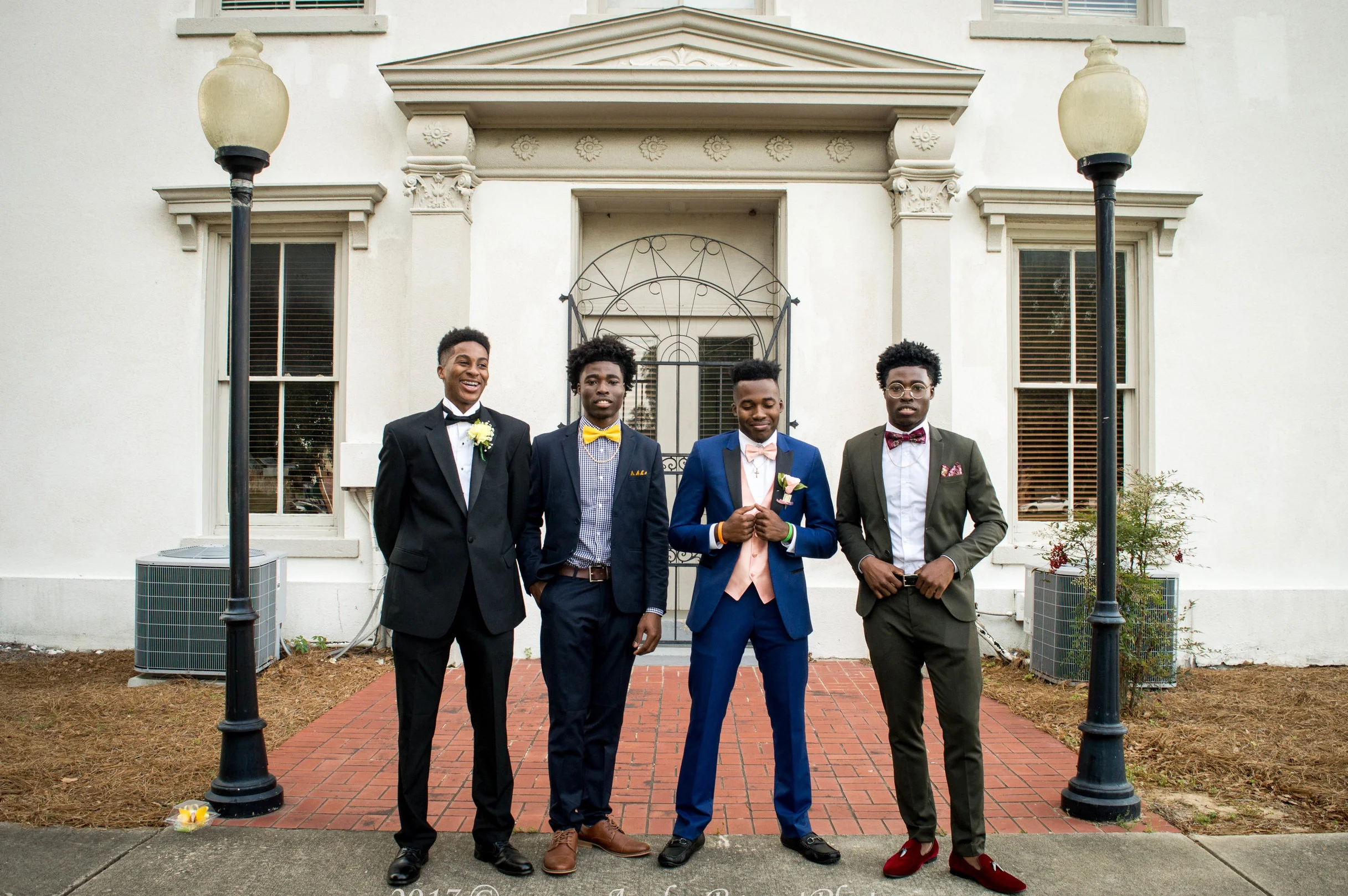  Laroy and Laron posing with friends for group prom photos in Quitman, Ga. 