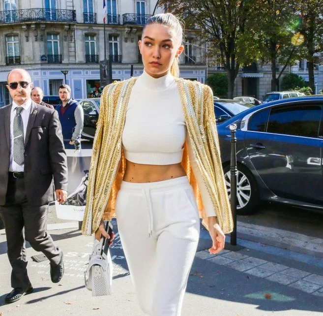 SneakHER Style: Gigi Hadid in Balmain Resort x Jonathan Simkhai x adidas Originals
