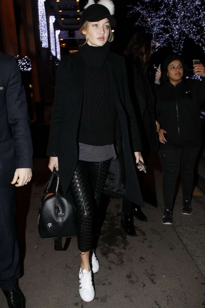 Hello again Gigi! The model traipsed about Paris earlier this week in adidas Original Superstar sneaks.