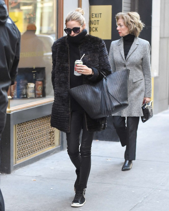 Black fur, turtleneck, leather leggings, and high-top sneakers were the move for Olivia Palermo while out and about in the Big Apple. She always looks amazing.