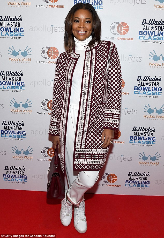 Hey Gabby! Gabrielle Union was a bright spot at a charity bowling event. The actress was radiant in a white jumpsuit, an embroidered jacket, and white leather Buscemi sneakers.