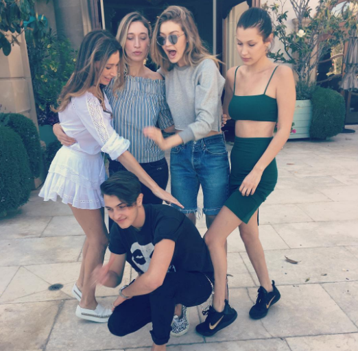 Bella Hadid celebrated sister Gigi's 21st birthday over the weekend with some family time in her Nike Kobe 11 Fade to Black Sneakers x Reformation Moss Two Piece in Spruce .