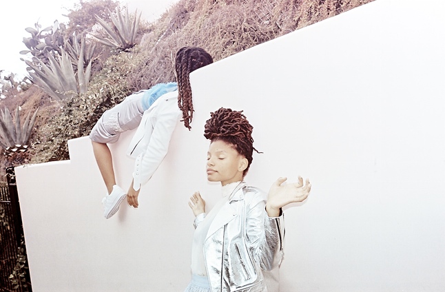 Halle wears a Laer jacket, with H&M top and skirt, and Adidas Superstars. Chloe wears Laer jacket with Jonathan Shimkai top, H&M skirt, and Adidas Superstars.