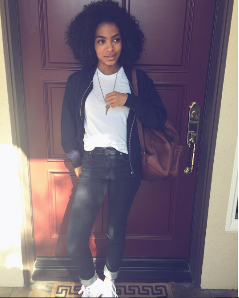 Actress Yara Shahidi stepped out super cute in rolled skinnies, a simple white tee, and a pair of Converse Classic high top sneakers . Love her.