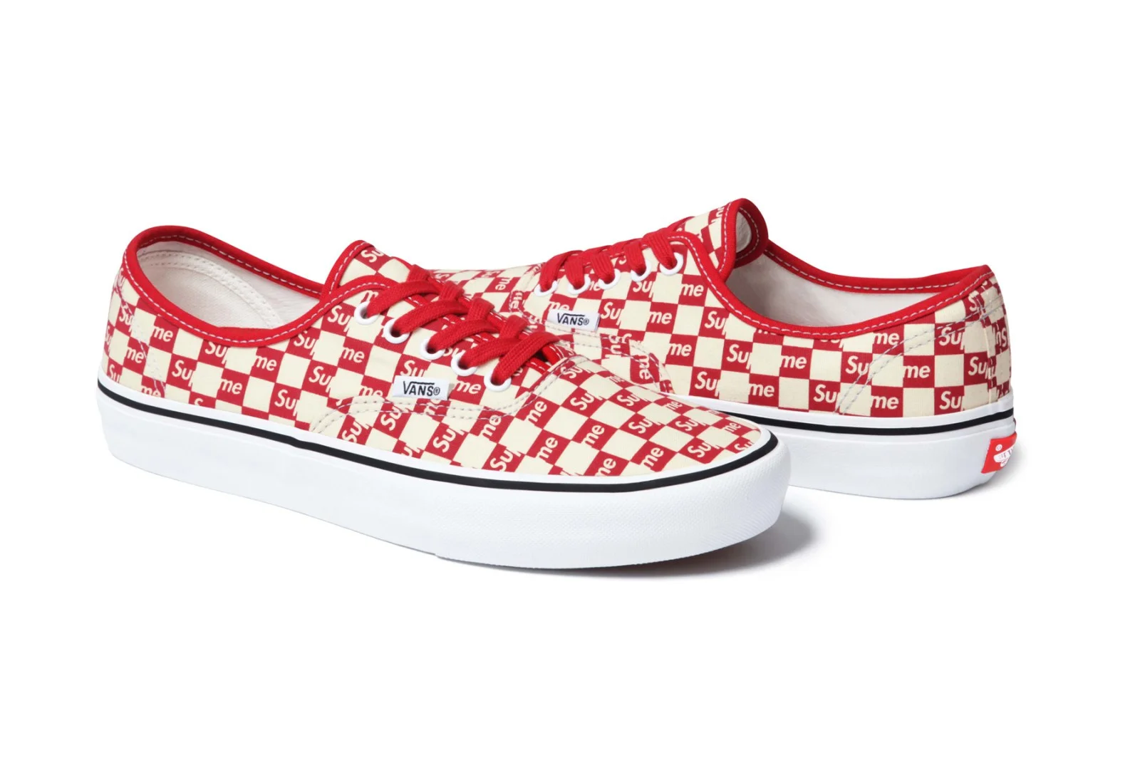 vans x supreme slip on