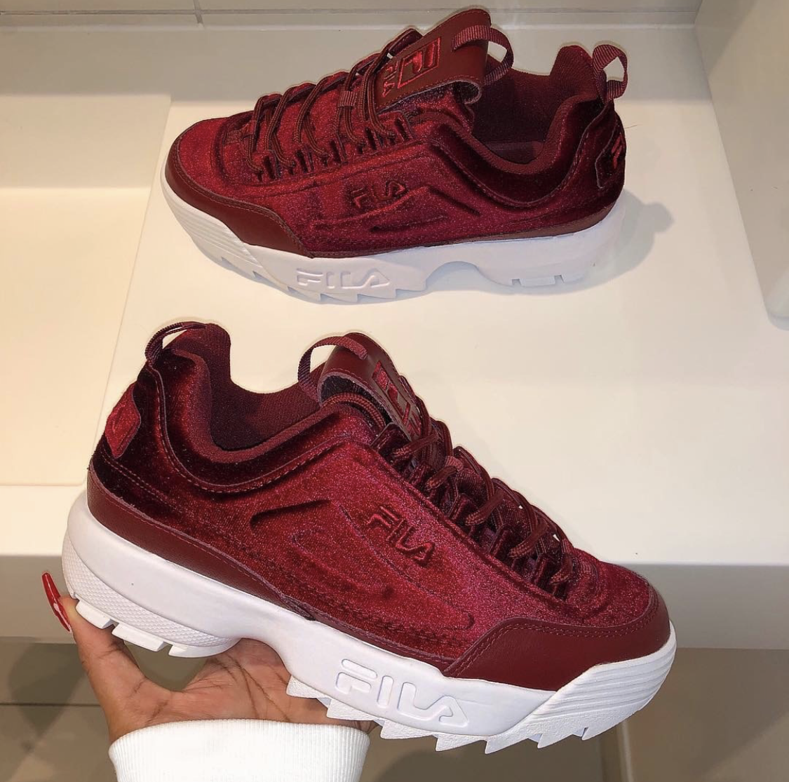 burgundy fila sneakers