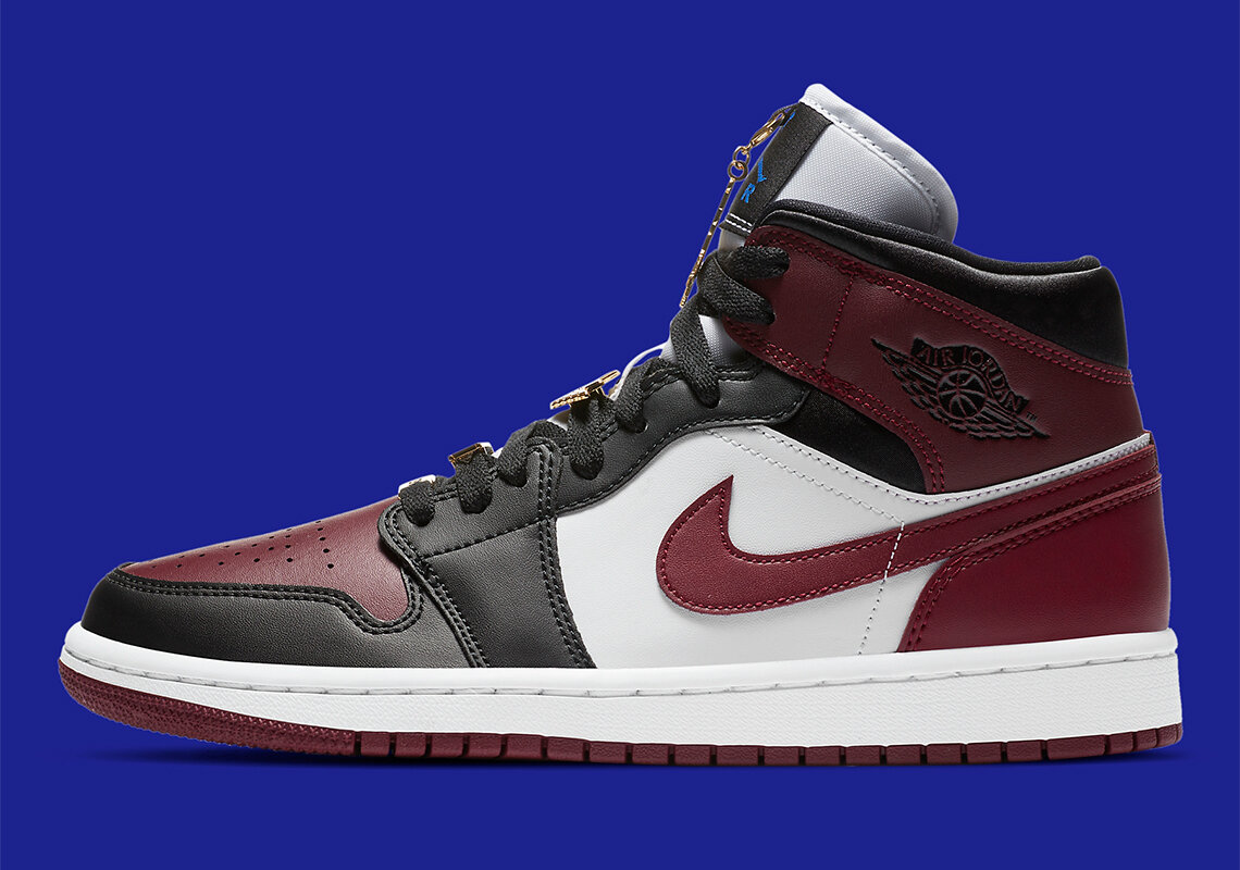 black and maroon jordan 1