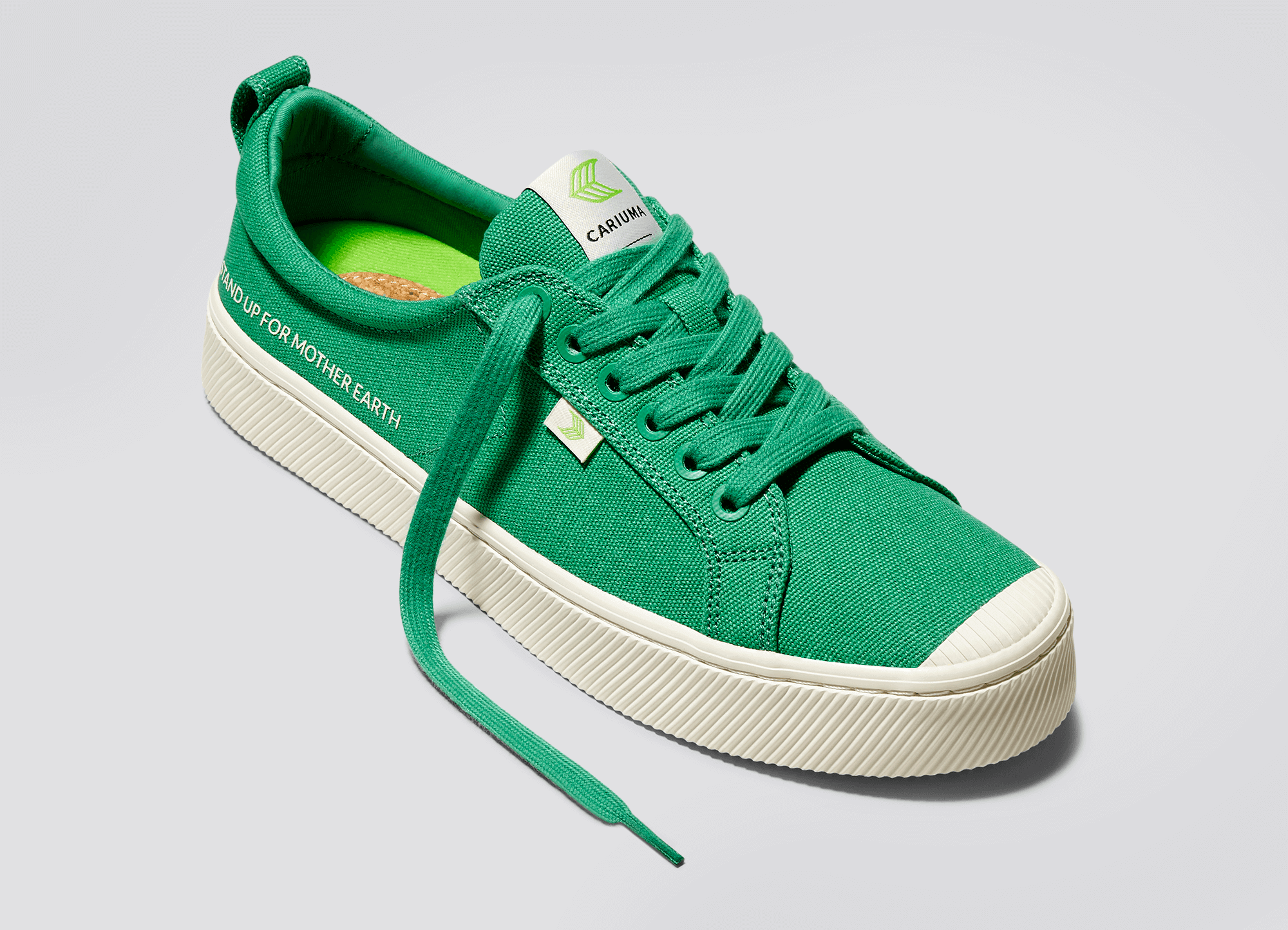 oca-low-top-earth-day-green-canvas-sneaker.slideshow3_e3269552-2eca-48c7-86d4-f90ef7dd1565.png