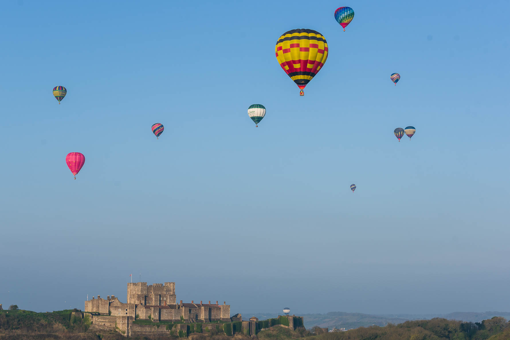 Hot ait balloons flying over Dover Castle