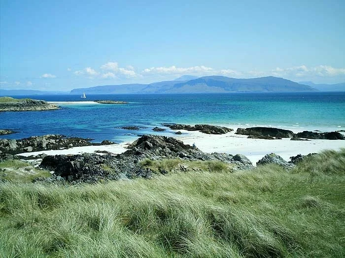 Iona is a tiny island off the southwest coast of Mull in the Inner Hebrides. It is only 1.5 miles wide by 3 miles long, with a population of around 120 permanent residents. Despite this, Iona has a special place in the heart of many people the world over. Go to http://www.welcometoiona.com