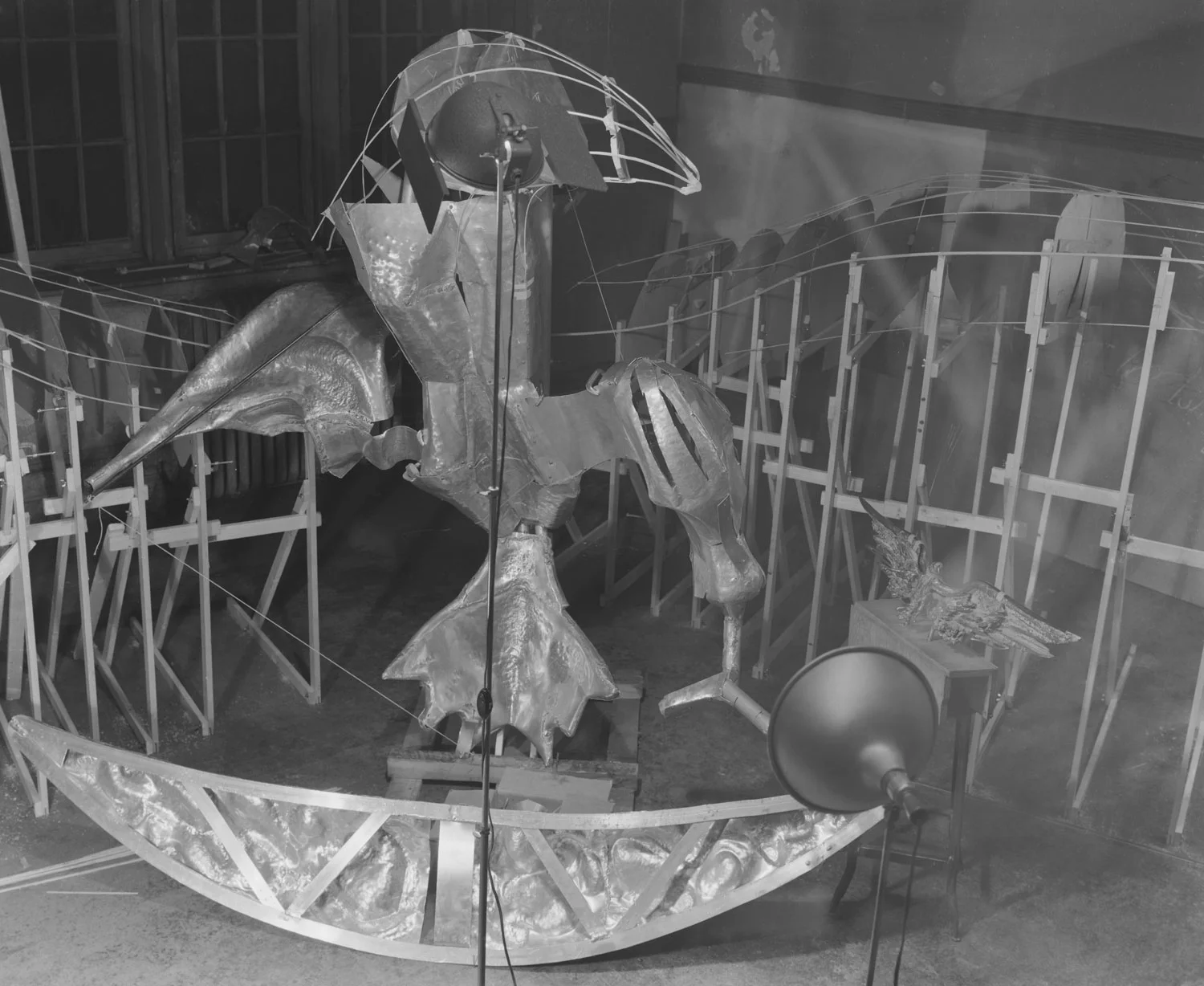 Eagle armature in studio with model (lower right)