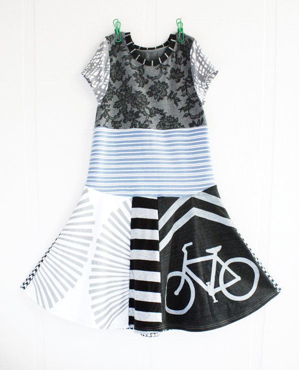8/10 blackbird/bicycle/bw Size 8/10 ~ 30β long, 13β across chest at underarm. Back skirt of dress is houndstooth neoprene. * sold out *
