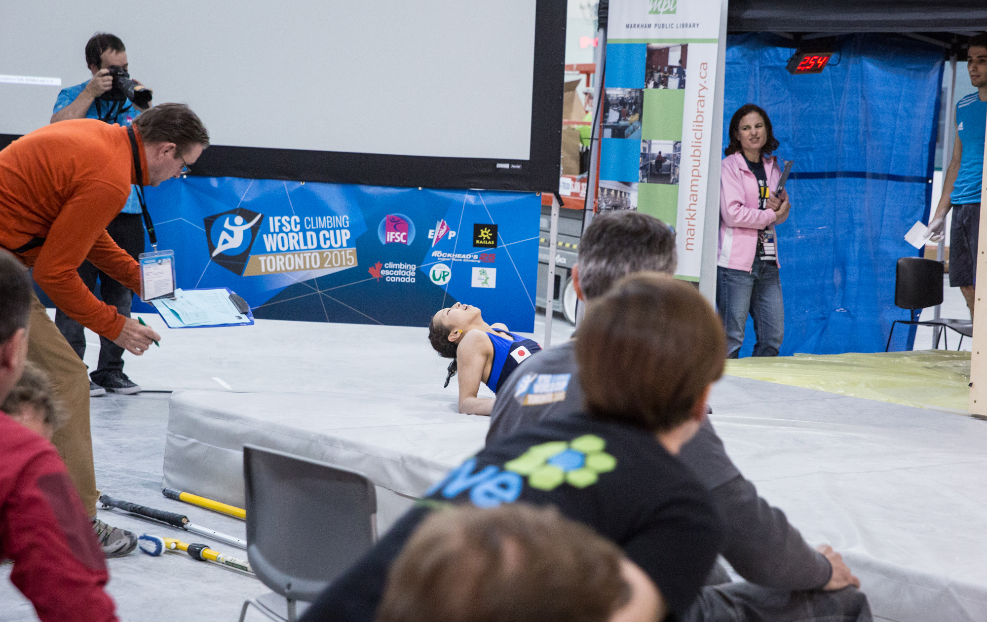 Akiyo Nogochi, 27, climber representing Japan at the World Bouldering Cup, almost makes it to the top of a bouldering problem, but slips at last minute.