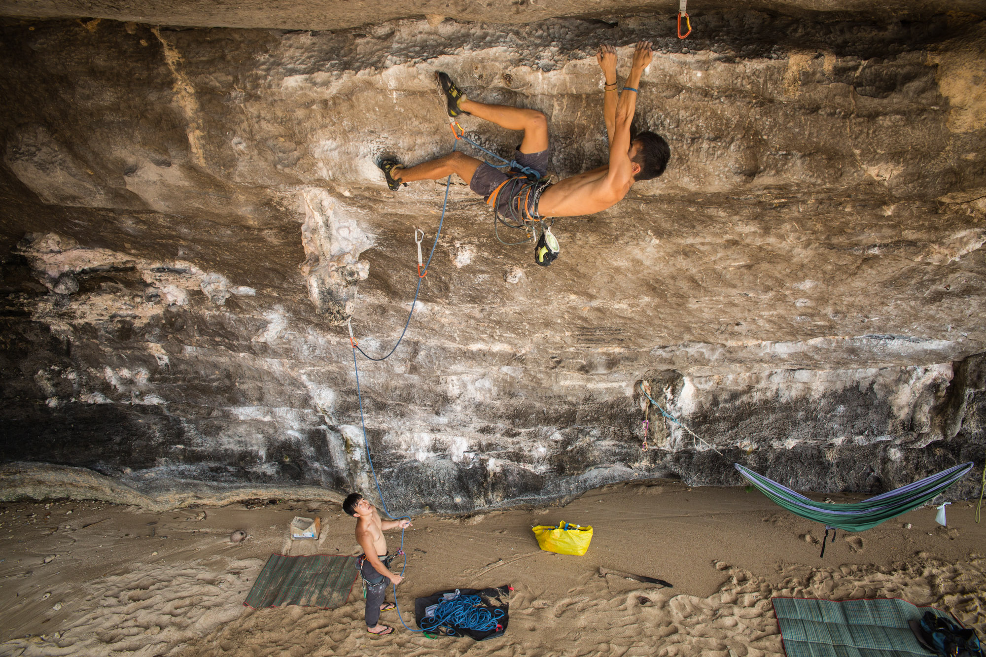 Matthias Lei mid-climb on his project at Tonsai Beach.