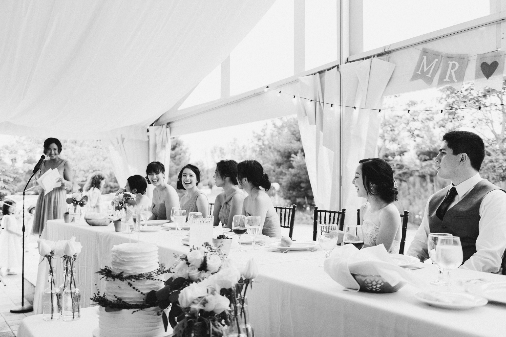 Giving my Maid of Honour speech, notice how everyone is laughing but the groom appears worried. :) Photo: Dave and Jen Stark