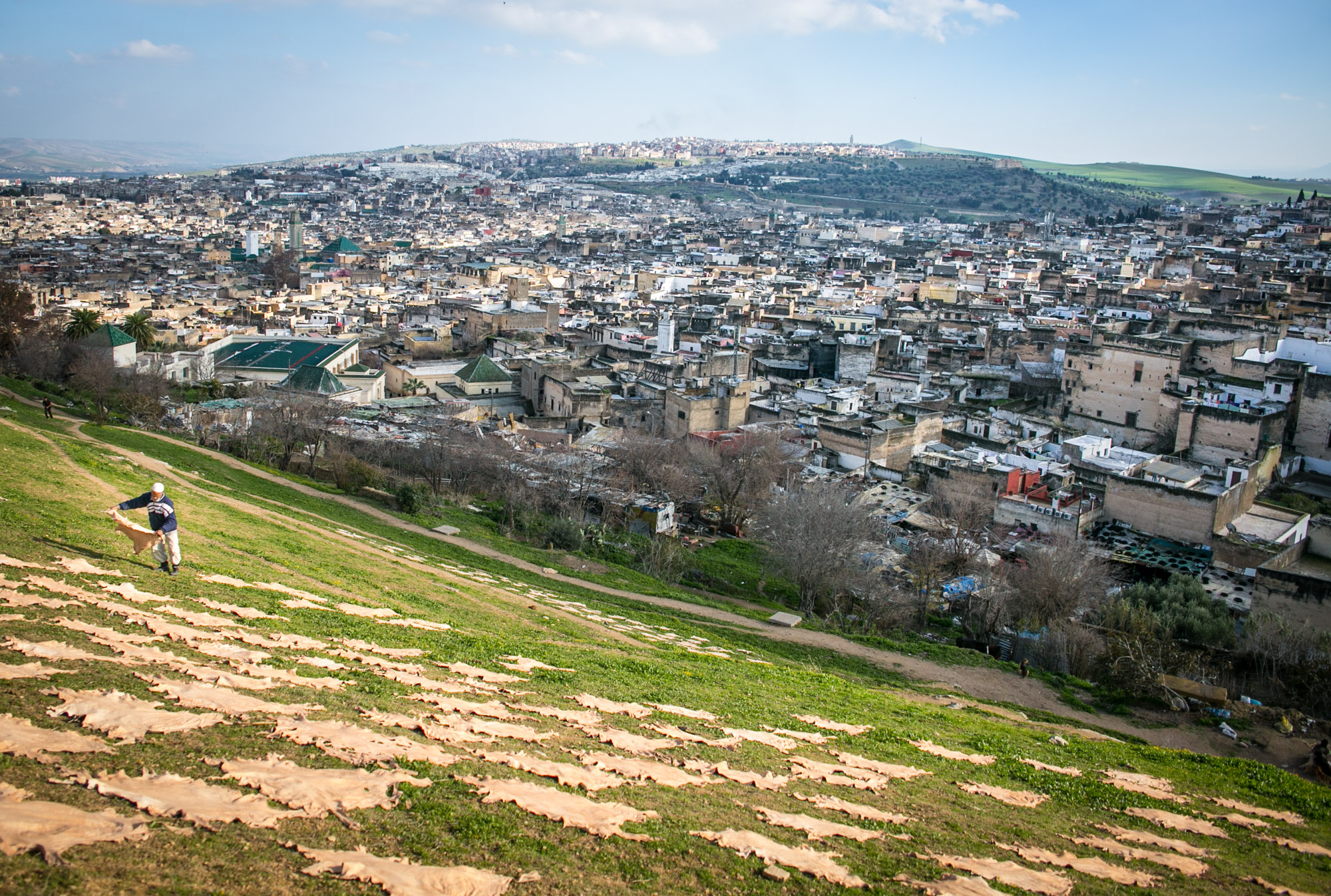 Fez, Morocco, is located in Northern Africa. The city has both Arab and French influences. One of the most important industries in Fez is the leather production industry, which requires several steps: skinning, soaking, drying, stripping and finally stitching.