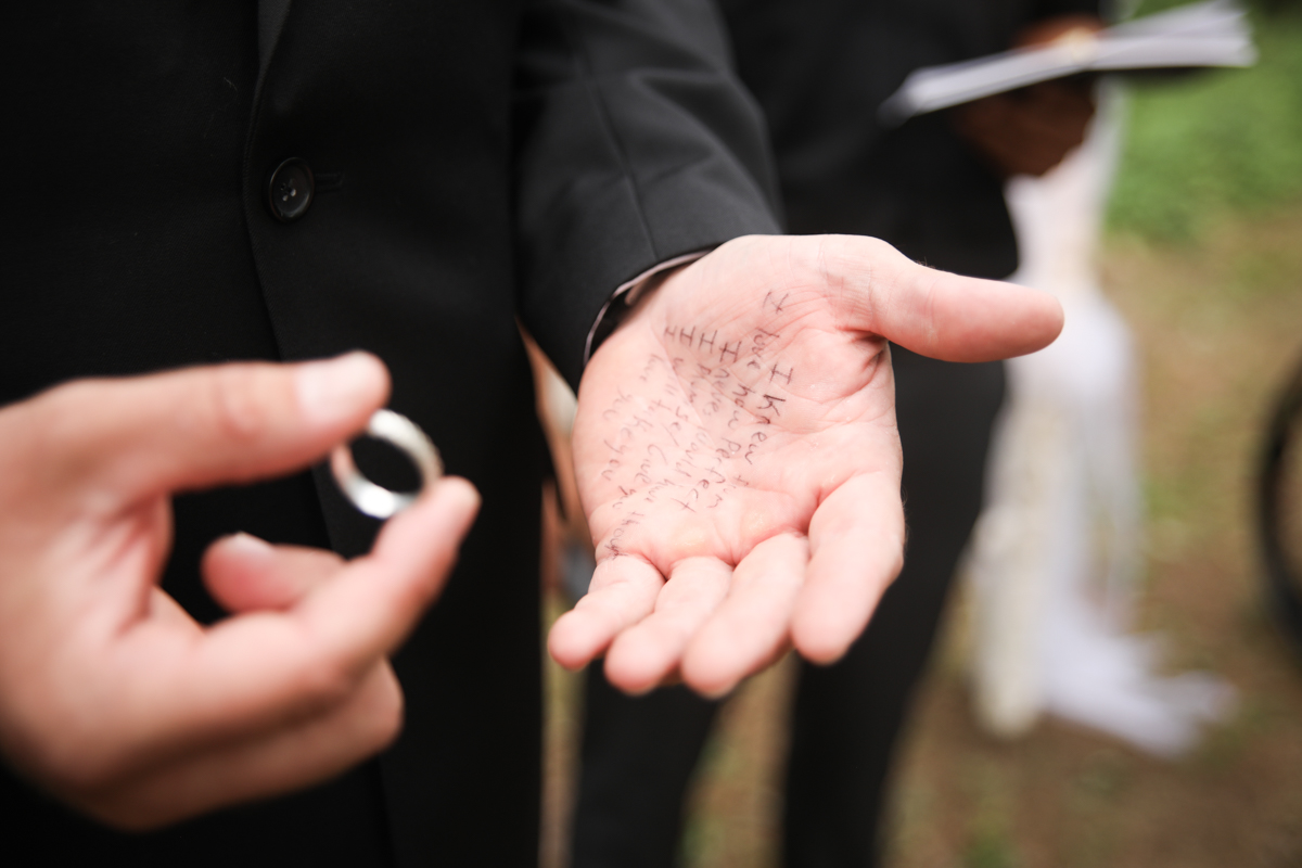 Vows written on the groom's hand before the ceremony.
