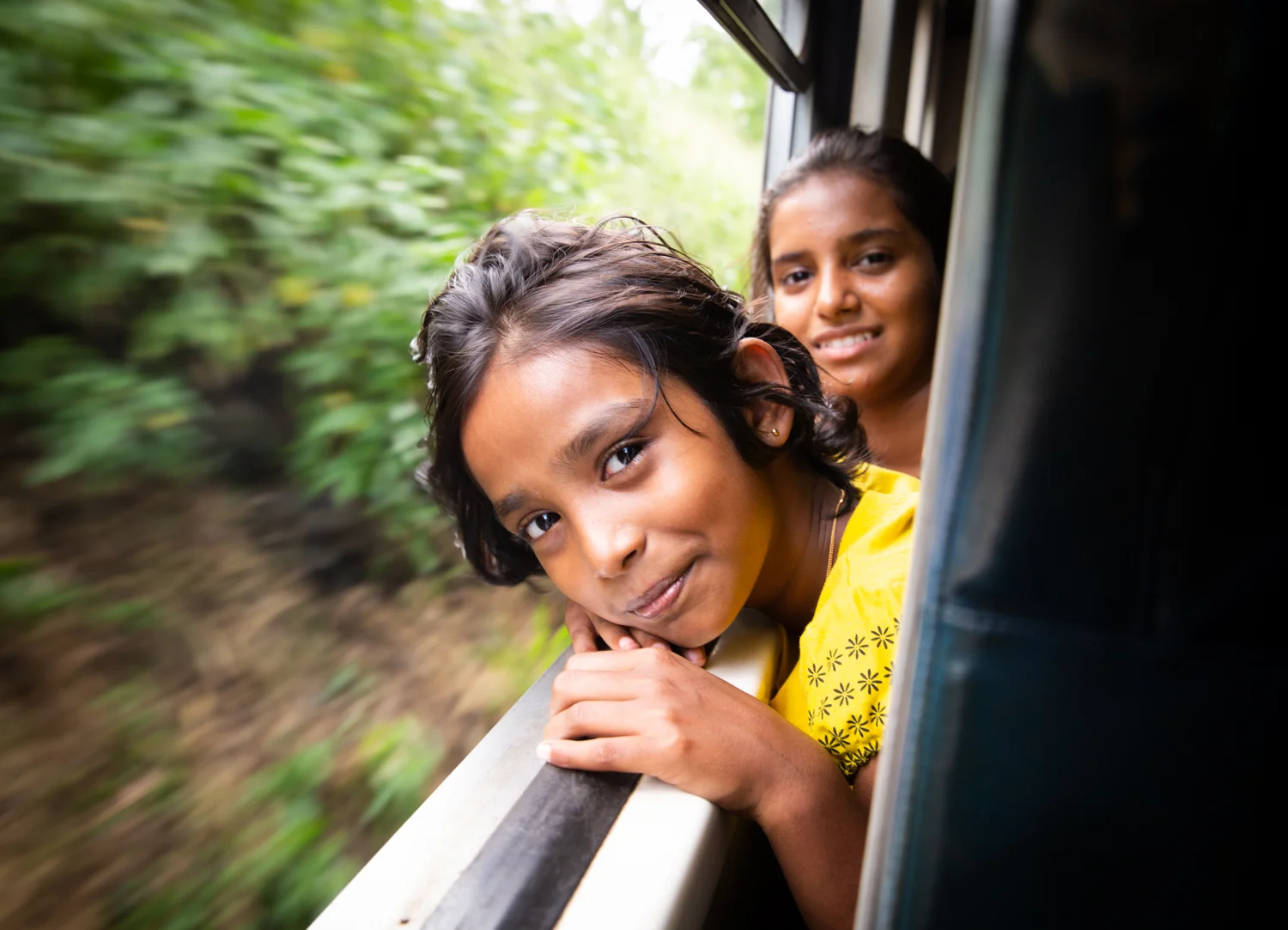 Girl on a train from Rambukkana, Sri Lanka to Kandy. 2019