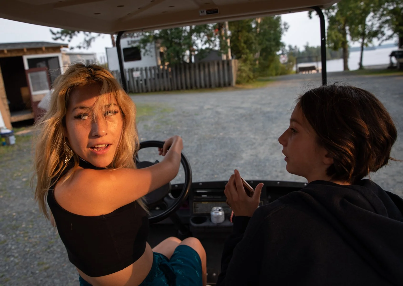  After dinner, Santasia drives with her friend on a golf cart around the resort as entertainment. 