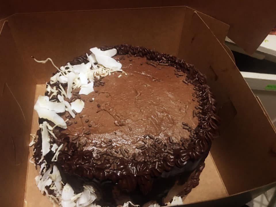 decedent vegan chocolate cake with a coconut ice cream center