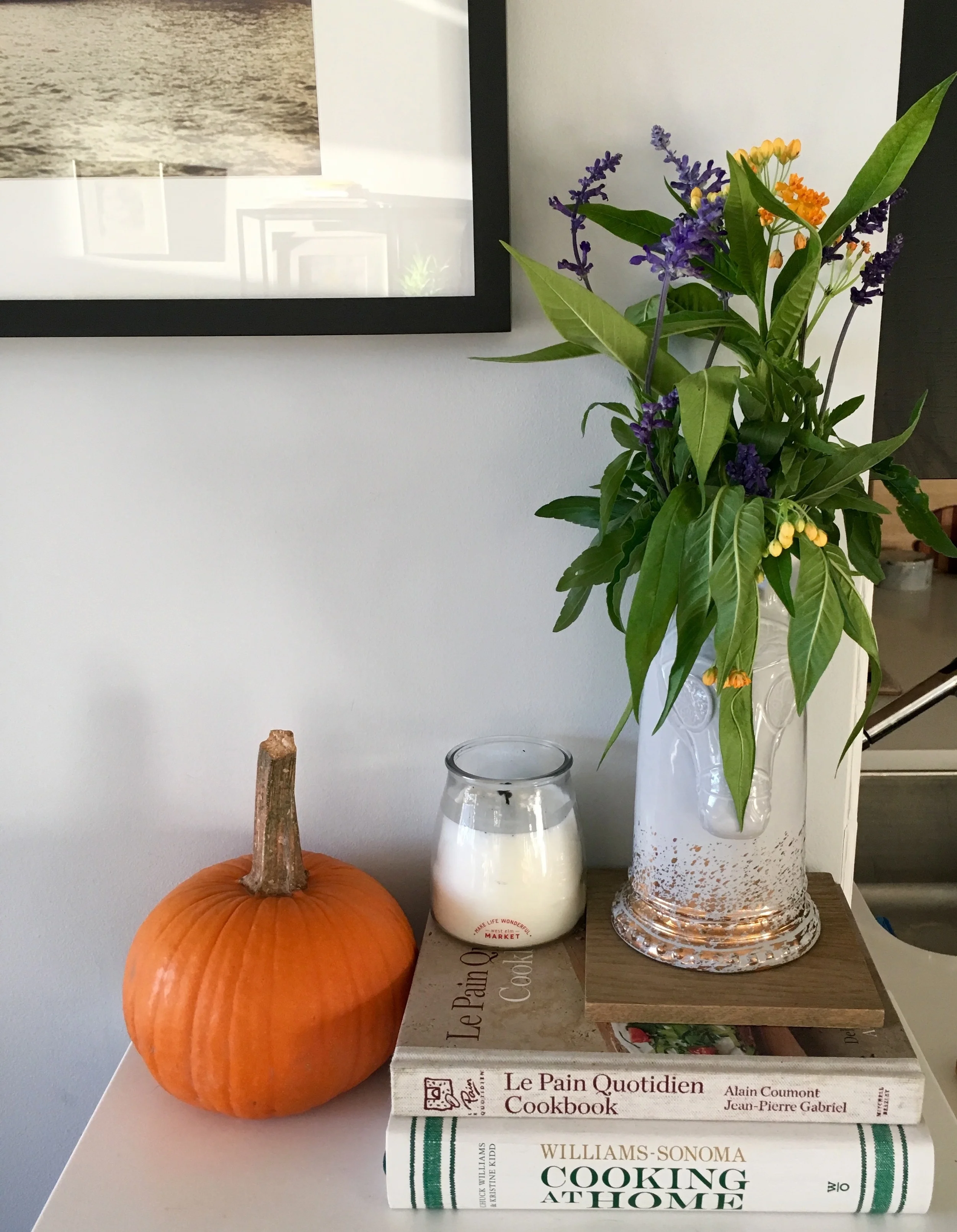 Our only orange pumpkin (plus my favorite Cedar & Lavender candle from West Elm Market )