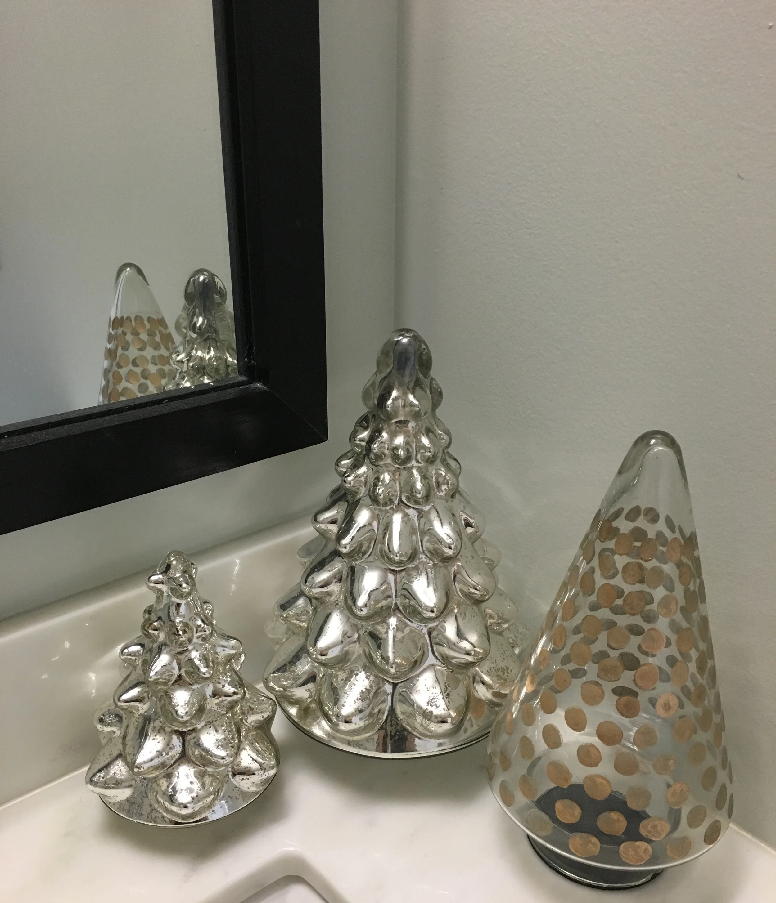 Mercury glass tree collection in our guest bathroom