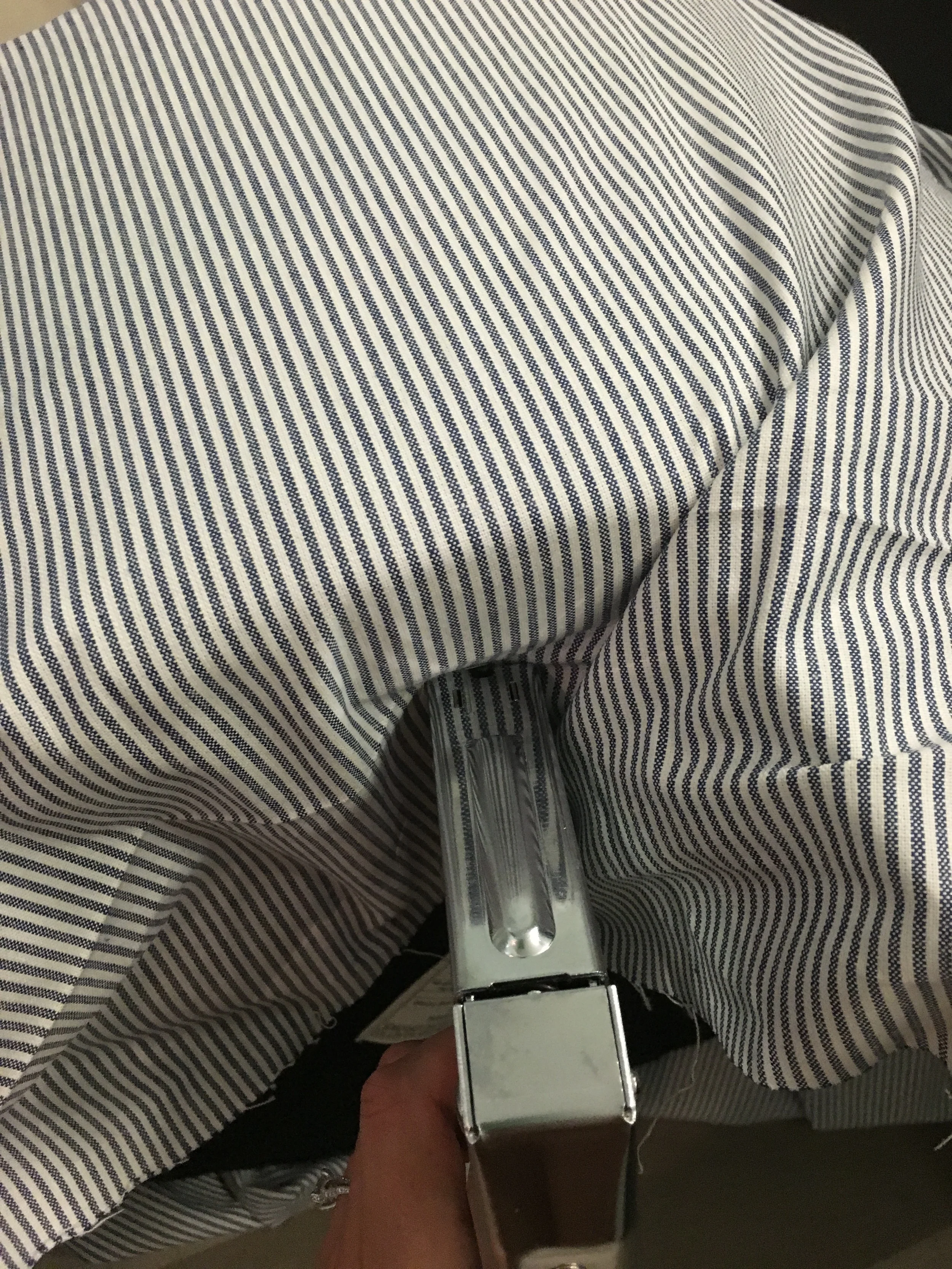 I purposely left a lot of extra fabric to make the folding and stapling easier to manage. 