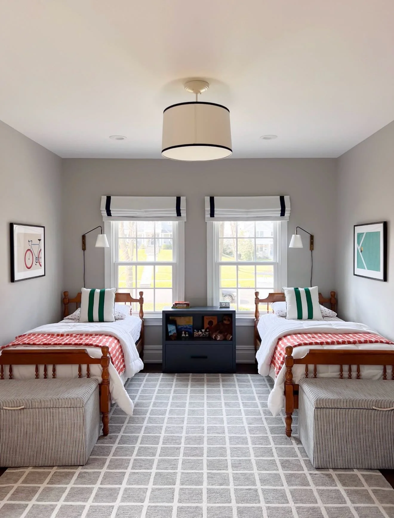 A preppy little boy&rsquo;s bedroom 🩶

I love the pattern mix we went with in here: stripes, windowpane and plaid. We kept it simple and neutral so the room can grow with him over the years, but incorporated pops of his favorite colors (orange and b