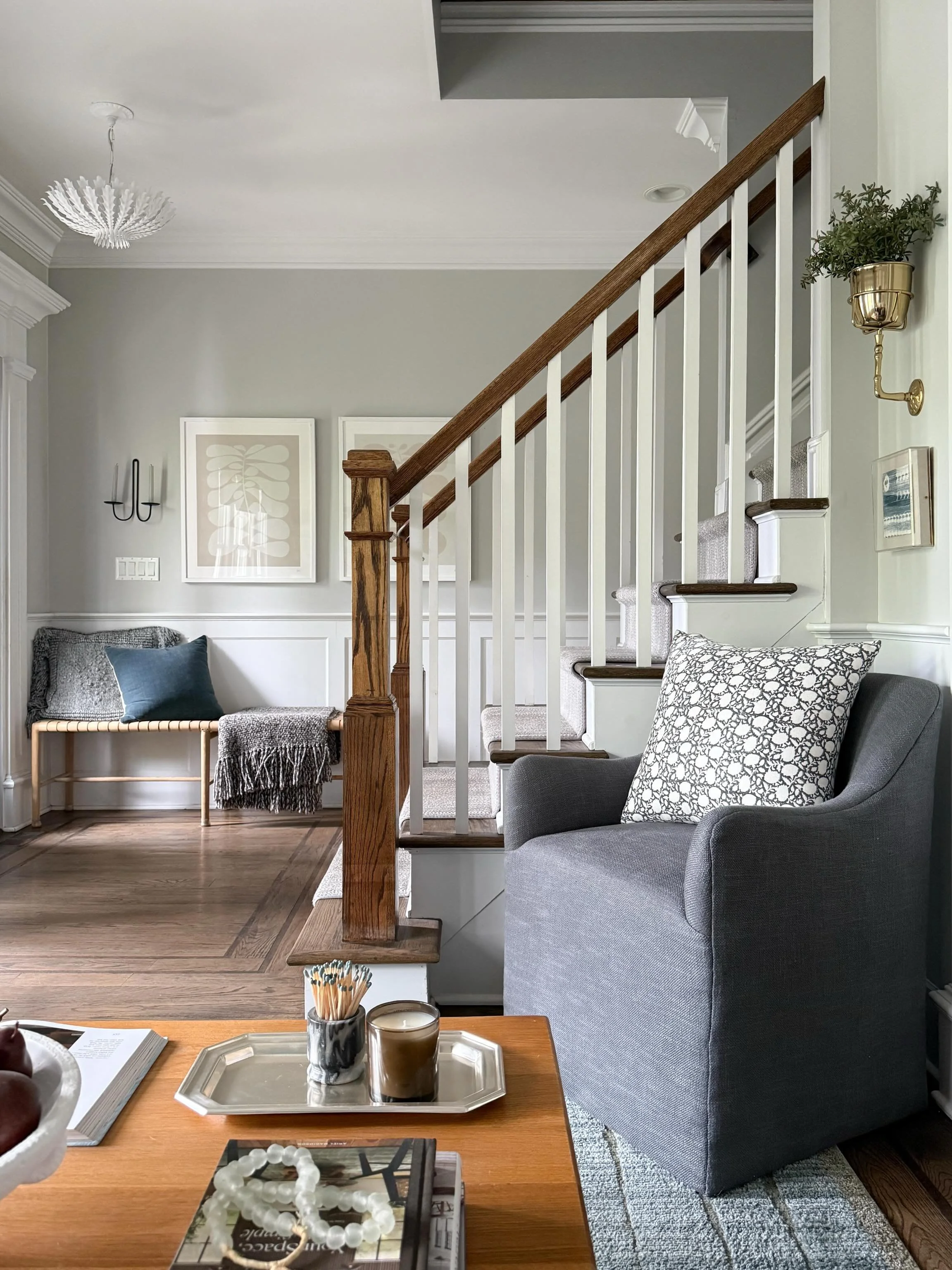 I turned this overlooked corner into a cozy spot just by moving around some furniture and accessories that we already owned and you&rsquo;ll want to swipe to see! Funny how some art and a chair can really make a space feel complete. Now tell me&helli