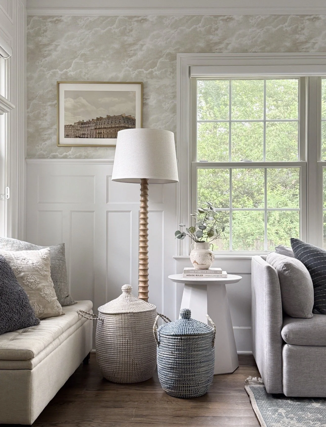 Serena & Lily La Jolla woven storage baskets styled in a living space with cozy blankets and coastal-inspired decor.