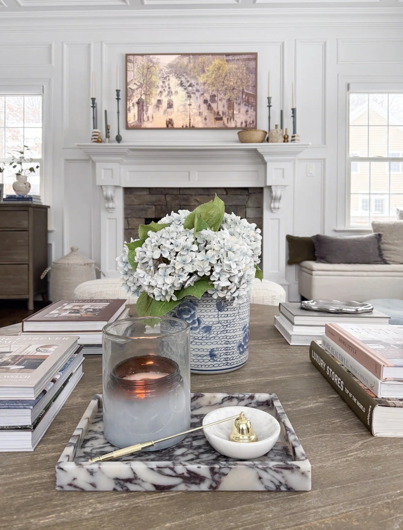 Amazon Prime Day coffee table decor featuring a marble tray styled with candles and decorative accessories in a living room.