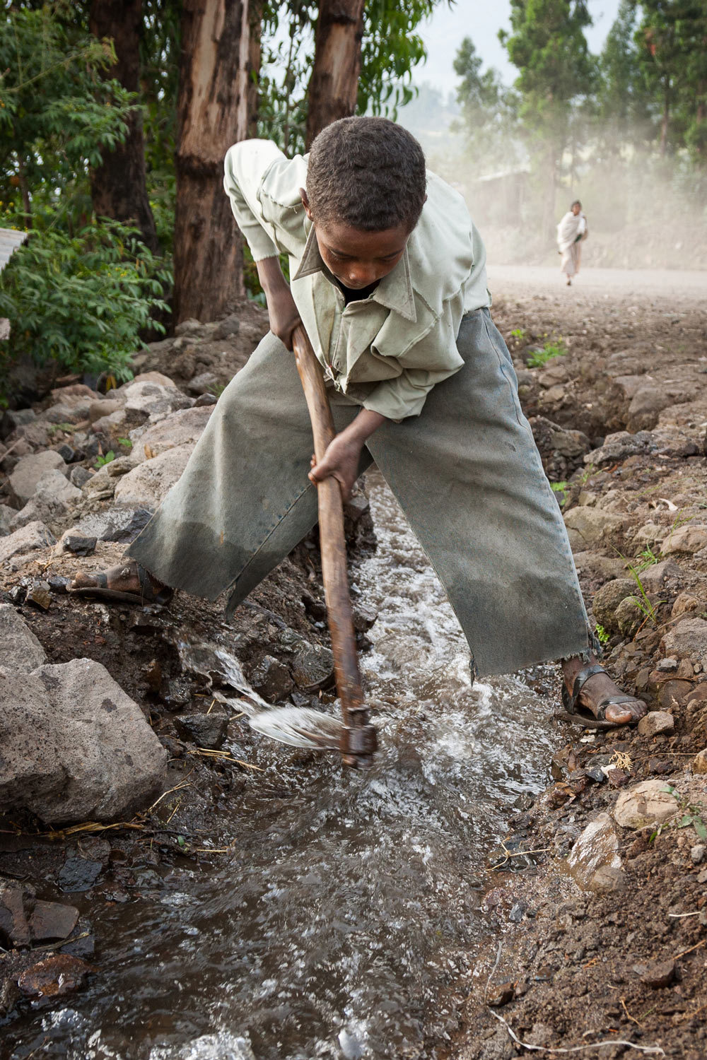 Ethiopia-boy-water-hoe.jpg