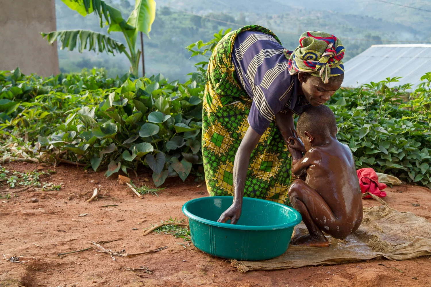 OPEN THIS PUBLICATION A CUP OF WATER: FULFILLING CHILDREN'S DREAMS THROUGH WASH