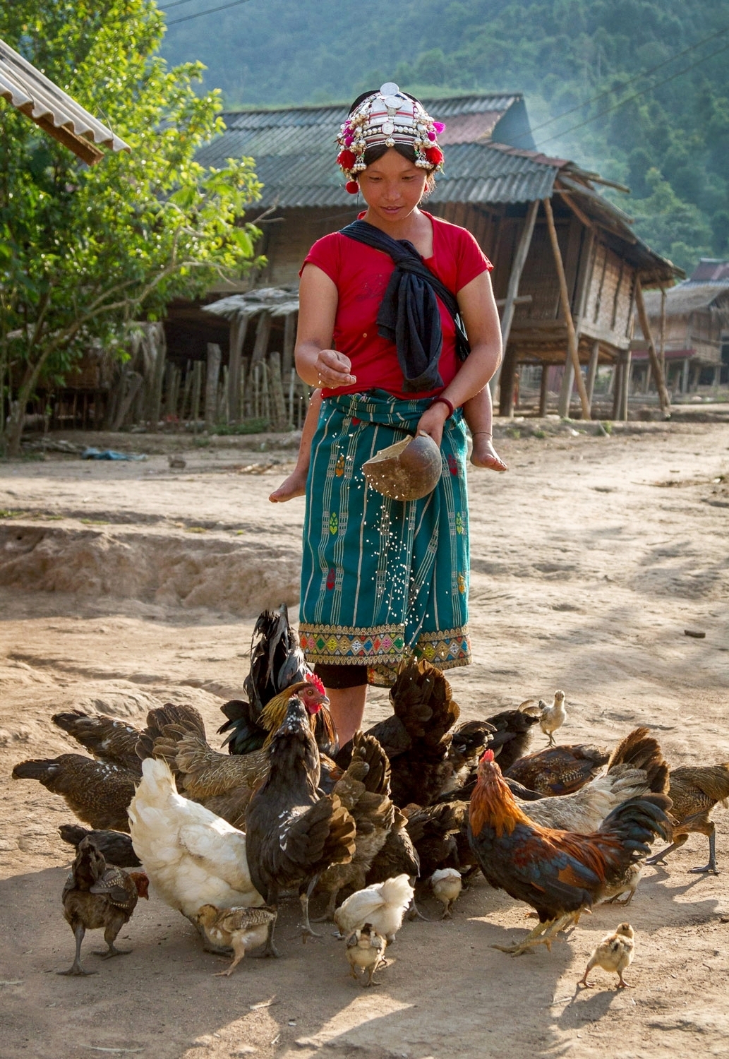  OPEN THIS PUBLICATION  UNICEF LAOS: SA PAE'S STORY   Feeding the ducks; Northern Laos 