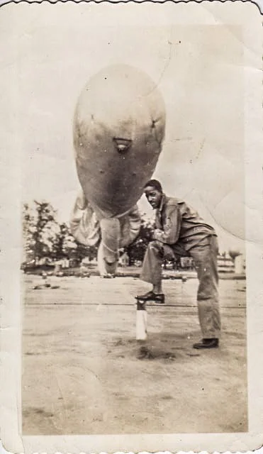 Wilson Monk poses with a barrage balloon likely at Camp Tyson, Tenn. Photo: Courtesy of the Monk family 