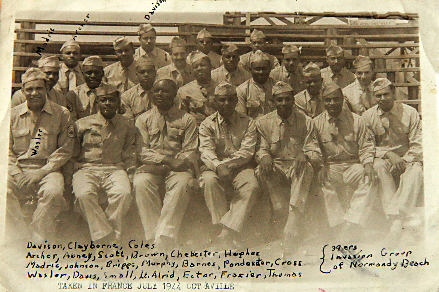 The men of the HQ battery of the 320th Barrage Balloon Battalion pose in France, July 1944.
