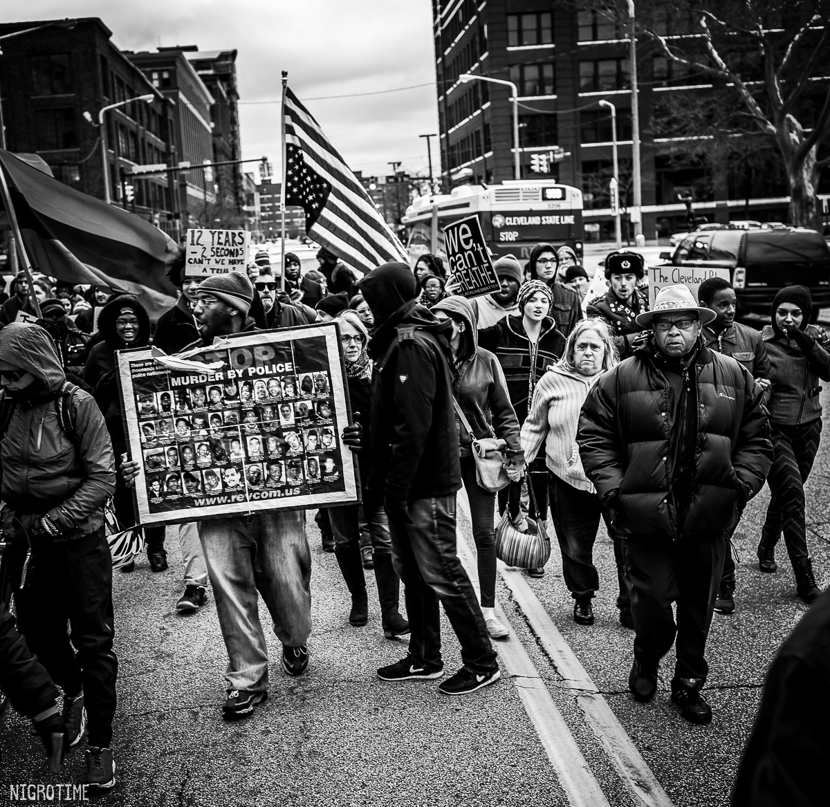 Charles See (far right) Director of Community Engagement observing the protest on December 29, 2015