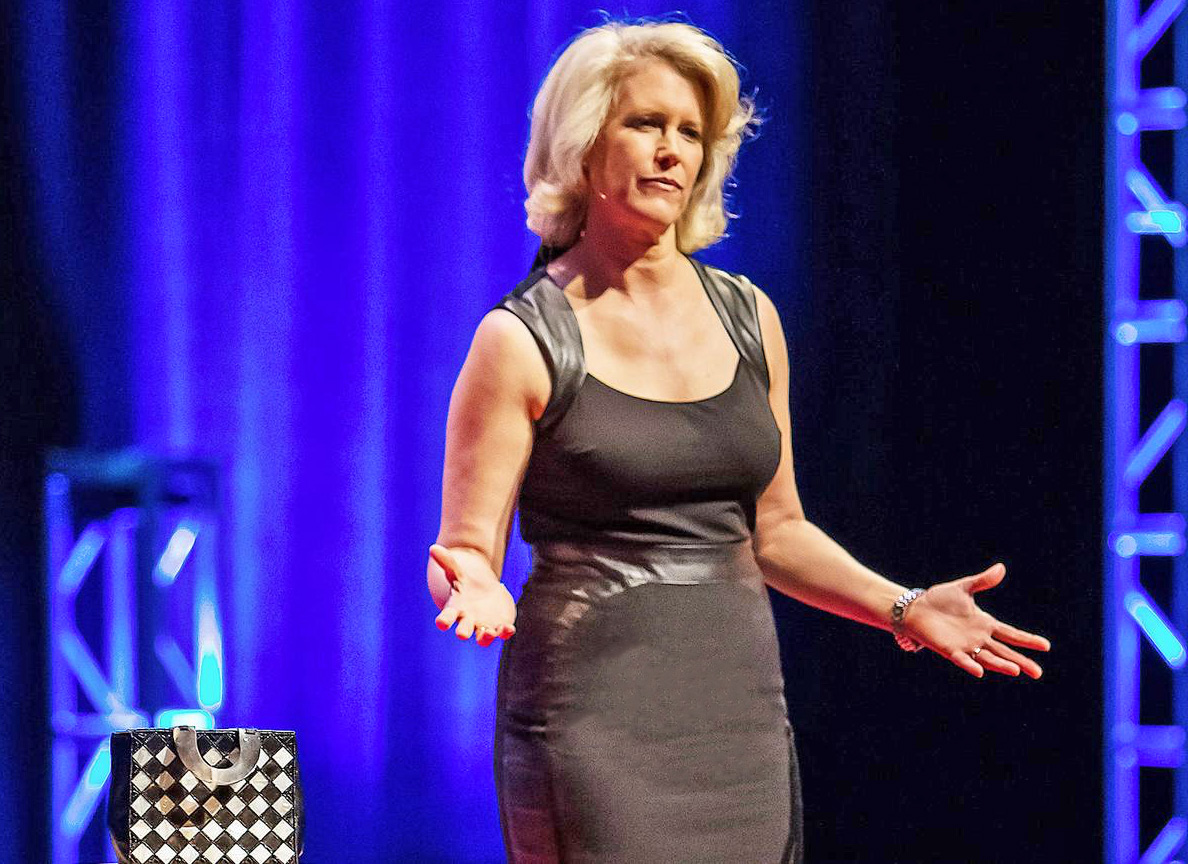 Leslie Morgan Steiner giving a TEDx Talk in Seattle about her experience with domestic violence