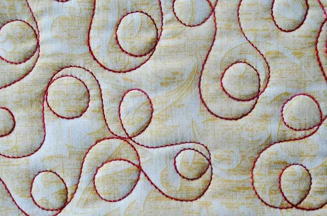 Loops machine quilting pattern with Fruitti