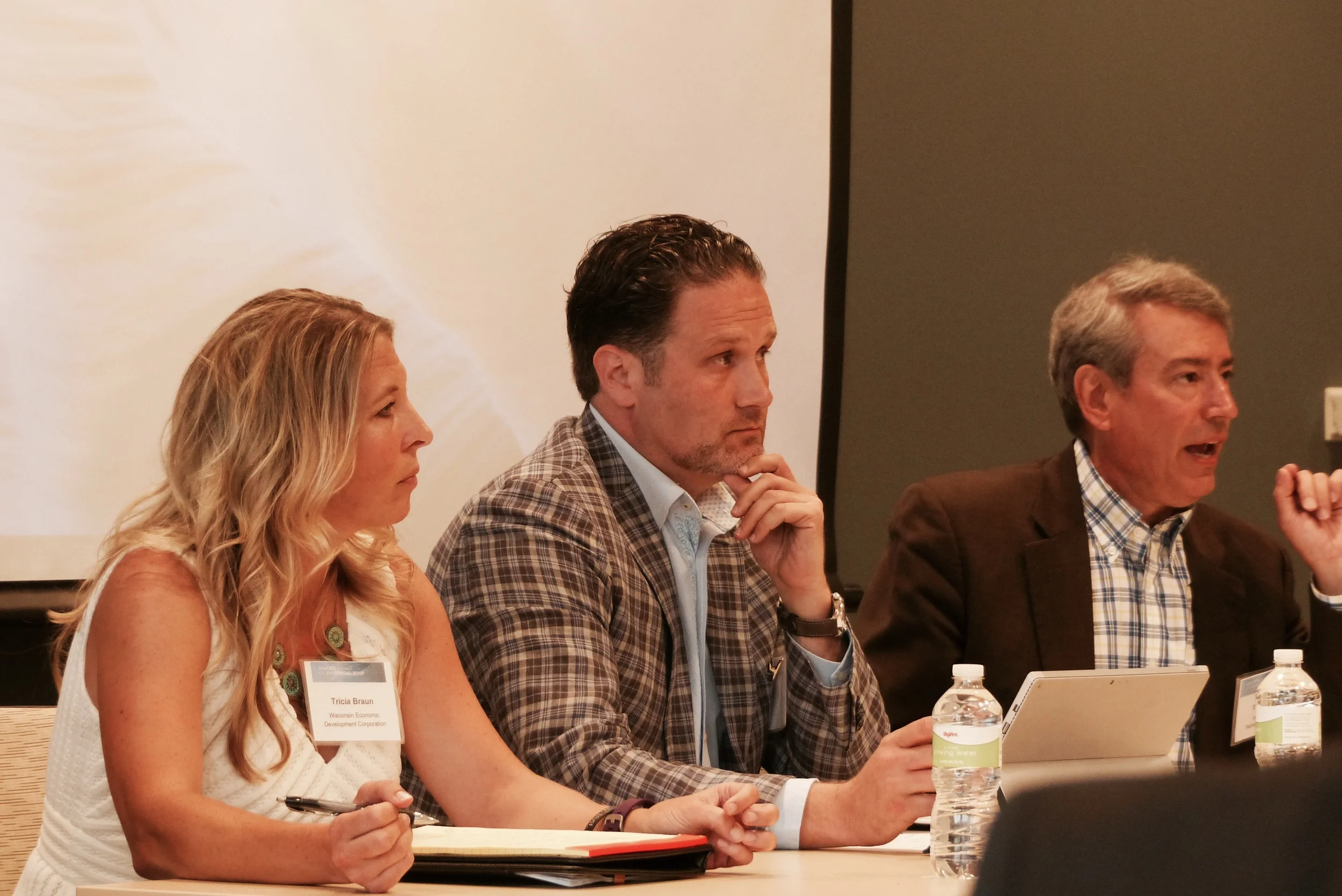 Panel Response: Paul Jadin , President, Madison Region Economic Partnership, (moderator), Tricia Braun, Deputy Secretary & COO, WEDC (left), Zach Brandon, President, Greater Madison Chamber of Commerce (middle) and Tom Still, President, Wisconsin Technology Council (right)