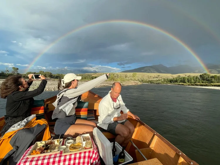 Double rainbow over Paradise Valley on a wooden boat tour on the Yellowstone River