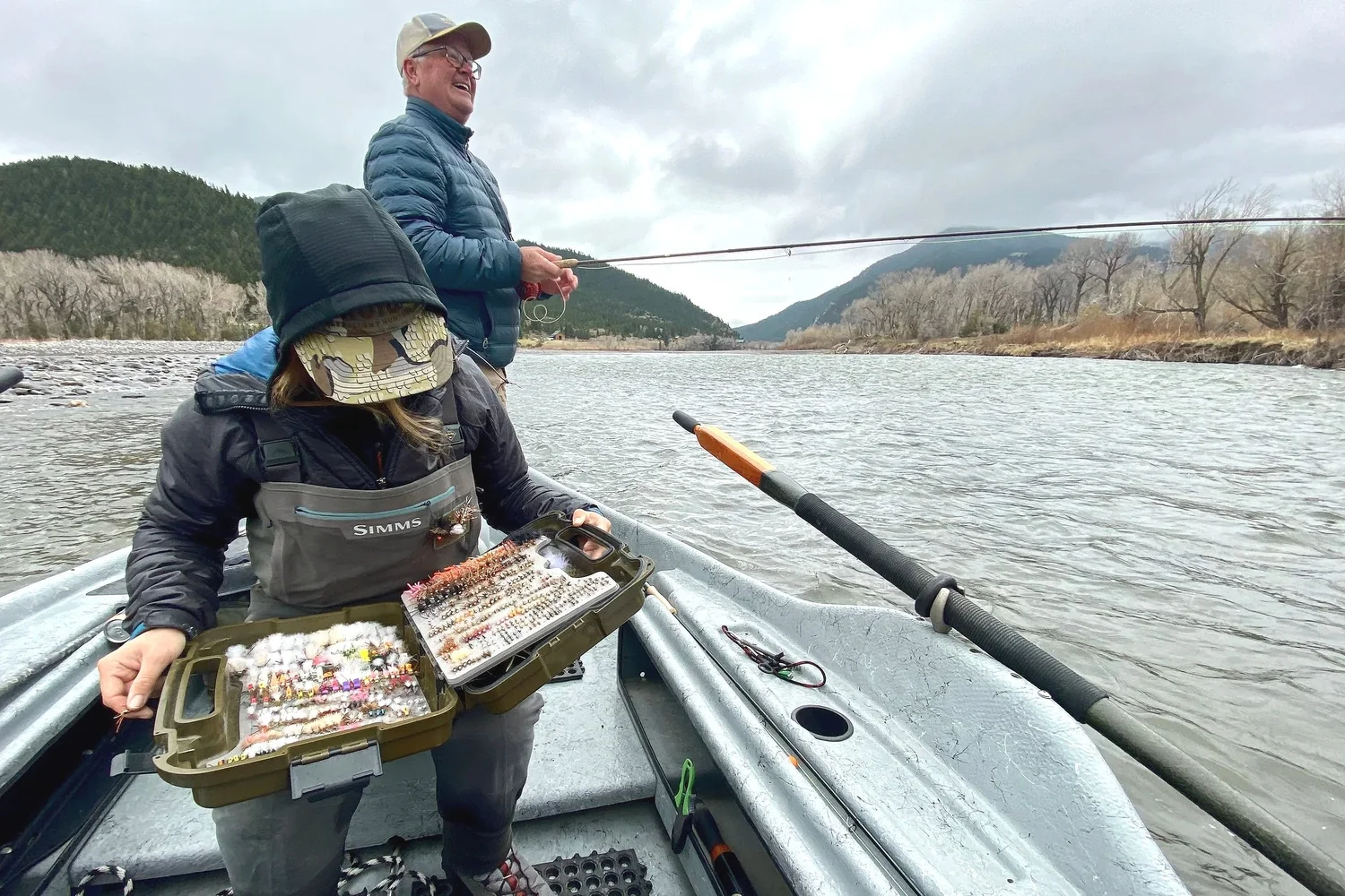 Winter drift boat fly fishing on the Yellowstone River in Paradise Valley near Livingston Montana