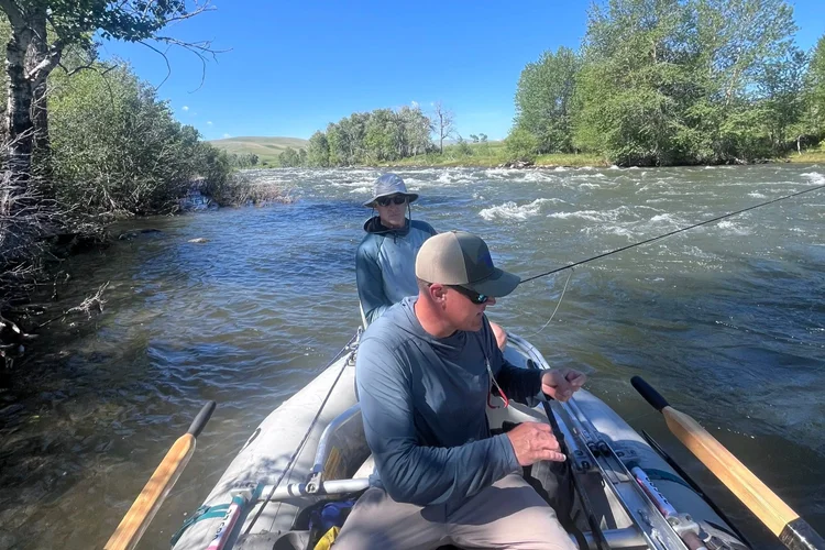 Raft fly fishing the Boulder River near Big Timber, Montana